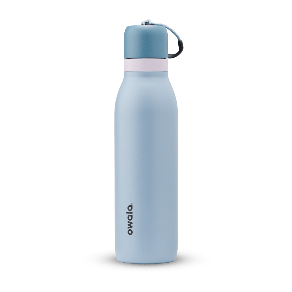 FreeSip Twist 24oz, coral pink body with orange-red lid and purple band; slim insulated bottle