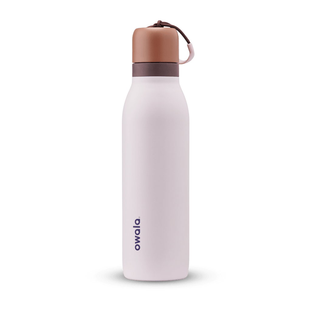 FreeSip Twist 24oz, coral pink body with orange-red lid and purple band; slim insulated bottle
